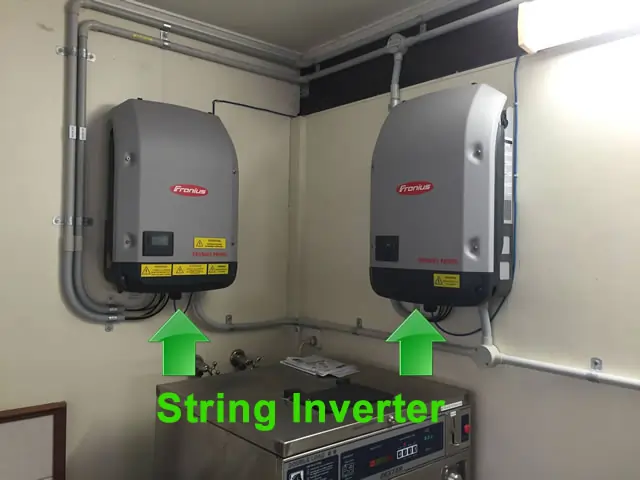A typical string inverter setup with two wall-mounted Fronius inverters.
