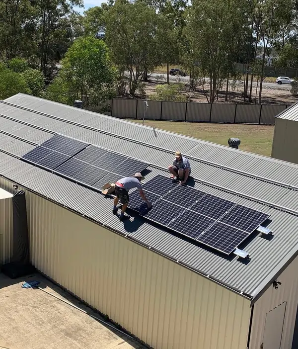 Charged Energy solar panel installation team at work.