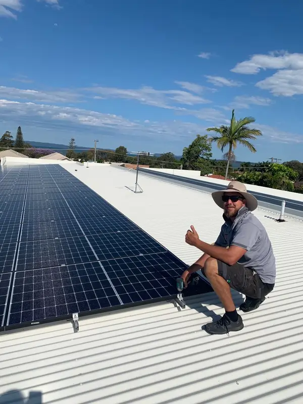 Charged Energy solar panel installation team at work.