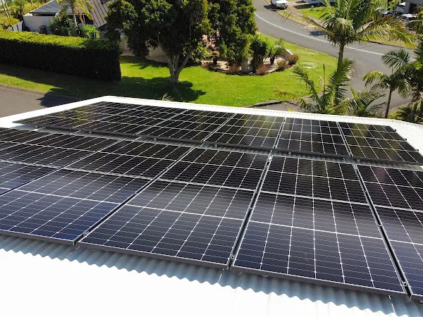 Image of solar panels mounted on a roof.