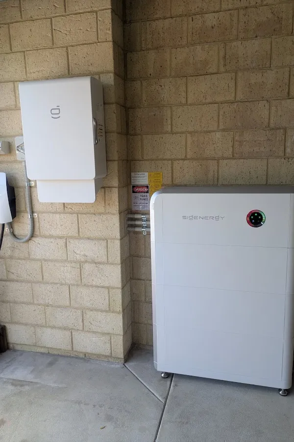Sigenergy home battery with Tesla EV charger.
