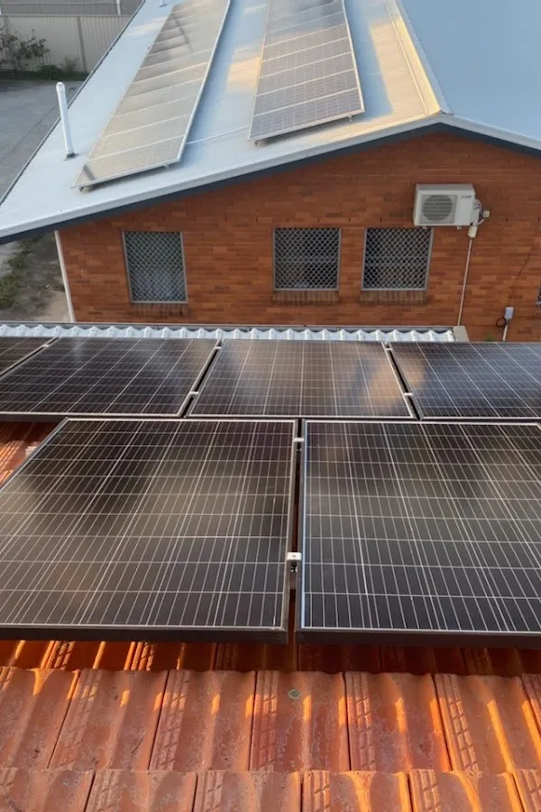 Image of some home solar panels from the Australian Enviro Projects Google Maps listing.
