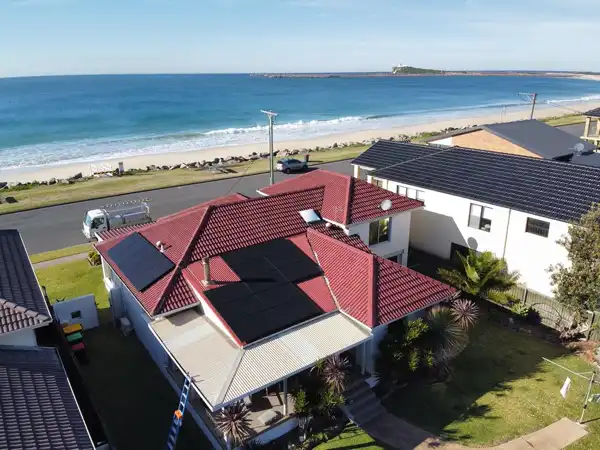 Home solar panel installation by the seaside by Hello Sun of Newcastle.