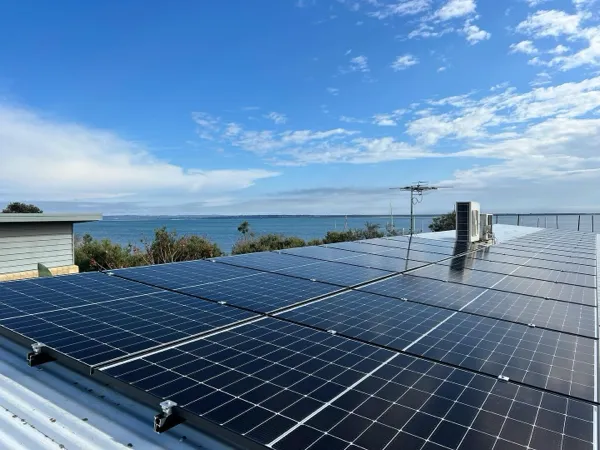 Nice image of some solar panels with the ocean in the background. Image from RJG Electrical and Solar's Instagram page.